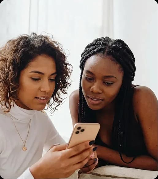 Health-care professionals discussing medical abortion training materials together during an online learning session.